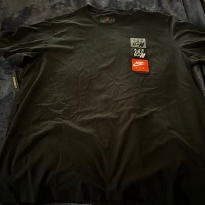 XL BLACK JORDAN TEE WITH PATCHES ON LEFT SIDE OF CHEST STANDARD FIT